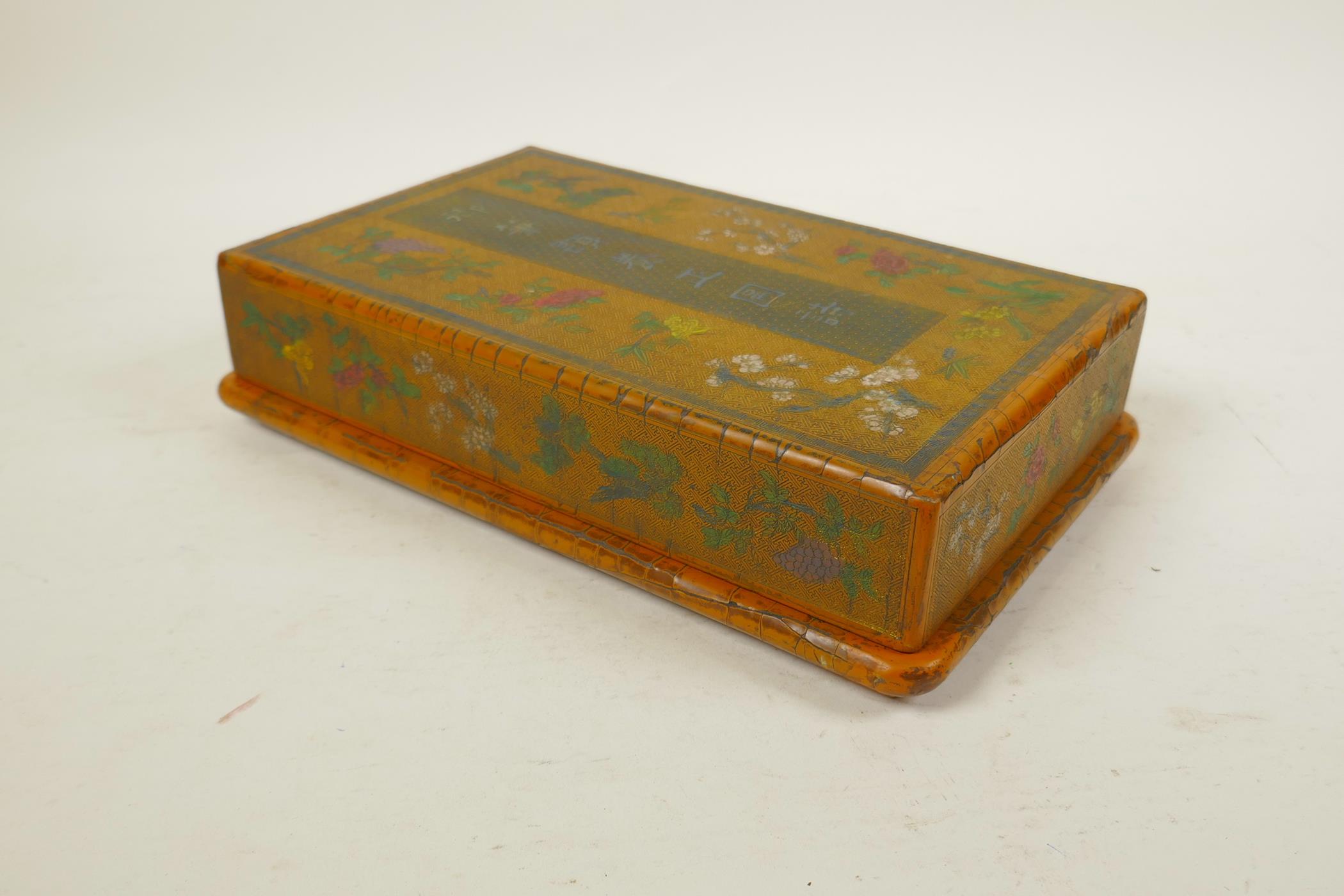 A Chinese orange lacquer scribe's box with engraved, painted and gilt decoration of Asiatic flora, 6