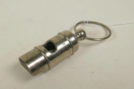 A reproduction silver plated White Star Line whistle, 4" long