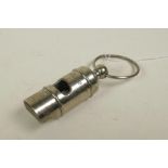 A reproduction silver plated White Star Line whistle, 4" long