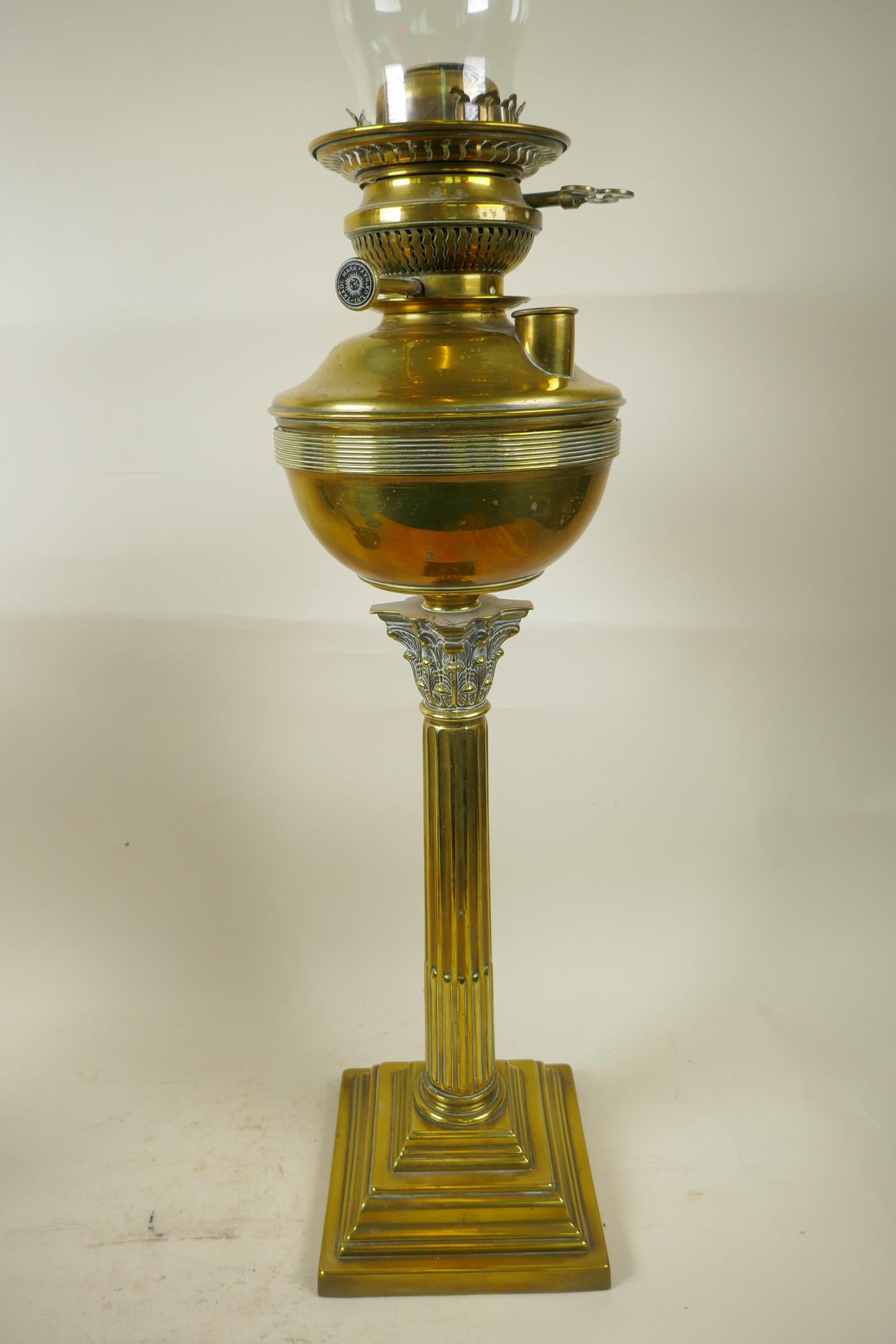 Three late Victorian brass oil lamp burners including glass chimneys, two beautifully cast in a - Image 6 of 6