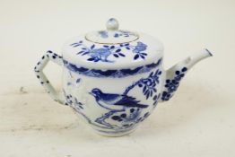 A Chinese style small blue porcelain teapot decorated with birds and blossom, A/F, 3½" high
