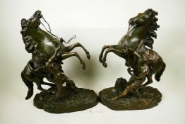 A pair of bronze Marly Horse figures, signed, 16" high