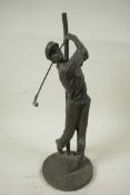 A bronzed metal table lamp base in the form of a golfer teeing off, 13" high