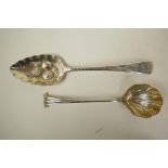 A Georgian sterling silver embossed berry spoon, hallmarked Thomas Wallis (II) and Jonathan Hayne,