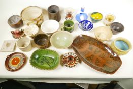 A collection of studio pottery vases and platters