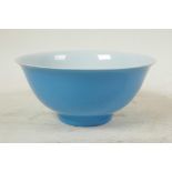 A Chinese turquoise glazed porcelain rice bowl, seal mark to base, 6" diameter