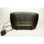 A 1950s Philips 'Triumph' Bakelite radio, model number: BIF 810A, serial number: 6324, dark brown