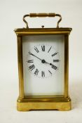 A French C19th brass cased repeated carriage clock by R. & C. Paris, a full glazed corniche case