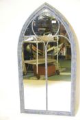 A Gothic style, metal framed, arched top mirror, 44½" x 23"