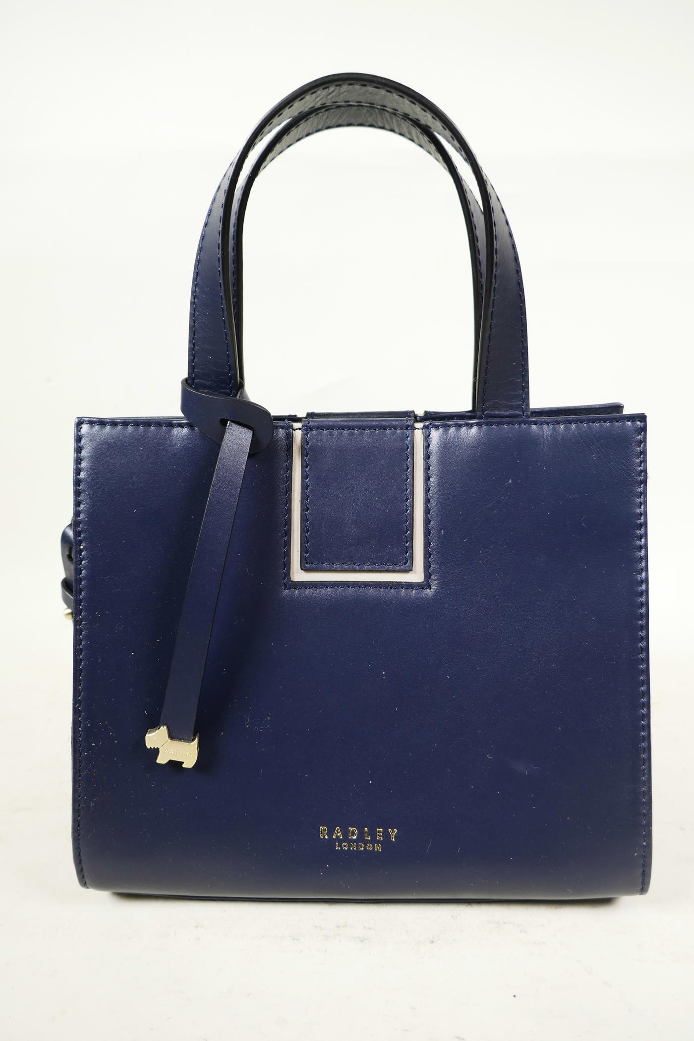 Four contemporary leather and faux leather handbags, including a new navy leather Radley small - Image 2 of 9