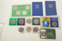 A collection of Great Britain commemorative coins and two sets of 'Britain's First Decimal Coins'