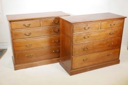 A pair of early C20th Waring and Gillows oak chest of two short over three graduated drawers