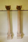 A pair of C19th architectural salvage Corinthian columns, comprising stripped pine bases and columns