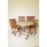 A 'Forrest Garden Furniture' teak table and six folding chairs