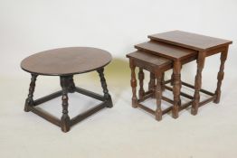 An oak topped occasional table, raised on turned supports, A/F, 23" x 15", and a nest of oak tables