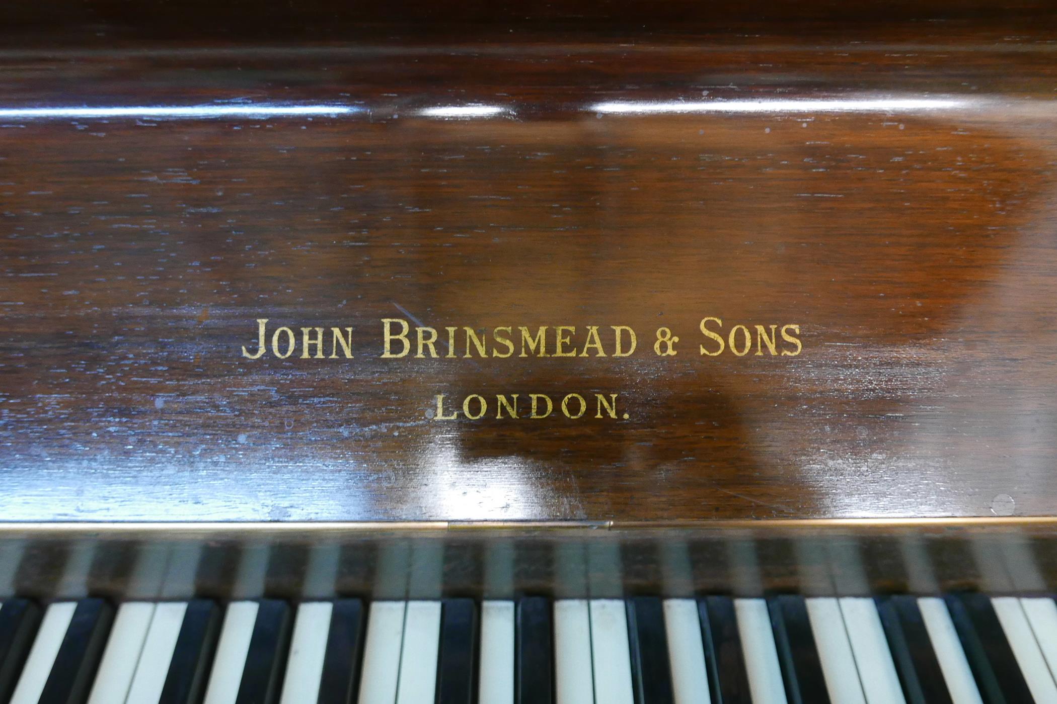 A John Brinsmead and Sons upright piano, with a rosewood case and iron frame, 56" x 26" x 51" - Image 4 of 6