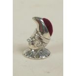 A novelty sterling silver pincushion in the form of a jester, 1¼"