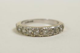 An 18ct gold half eternity ring, size 'N', gross 3.2 grams