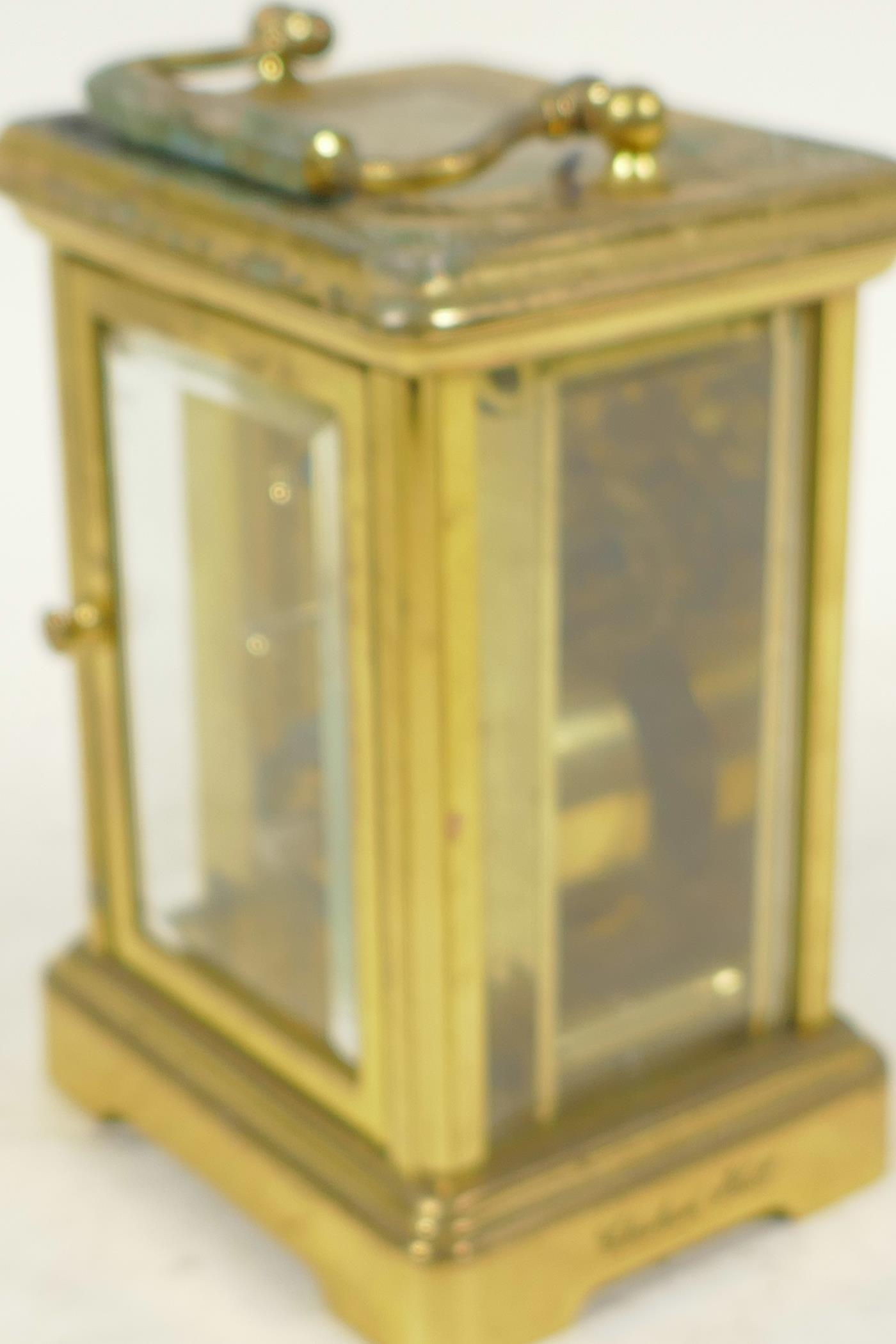 A brass cased carriage clock from the London Clock Company with white enamel dial and Roman - Image 3 of 4