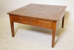 An inlaid walnut low table with single drawer, raised on tapering supports, top A/F, 34" x 34" x 19"