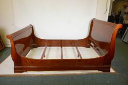 A mahogany double size sleigh bed, 58" wide