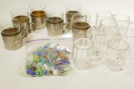 A set of six toddy glasses in engraved pewter holders, together with seven custard glasses and a bag