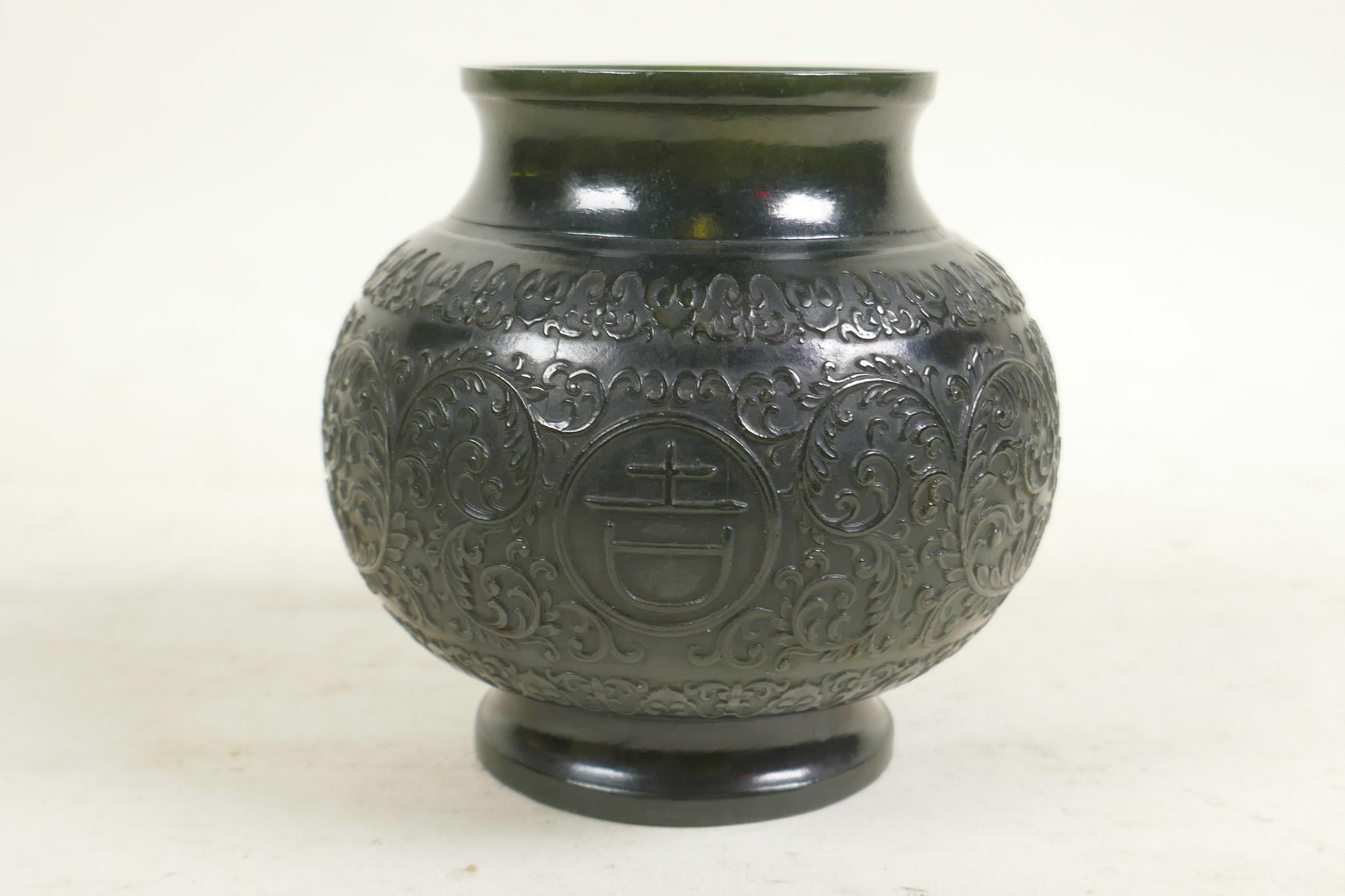 A Chinese spinach jade pot with carved scrolling lotus flower and character decoration, 4" high - Image 3 of 5