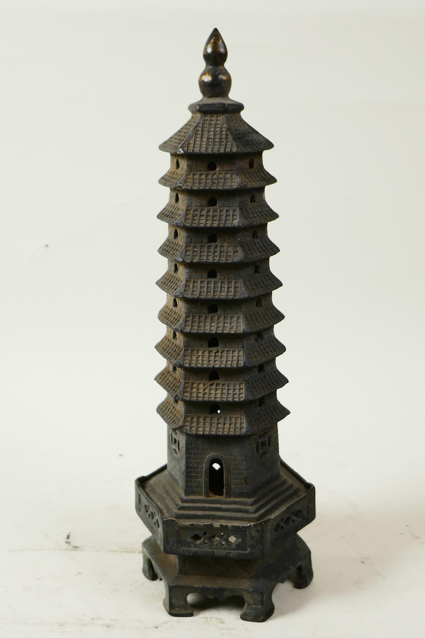 A Chinese bronze model of a tall pagoda, 11¾" high - Image 3 of 3