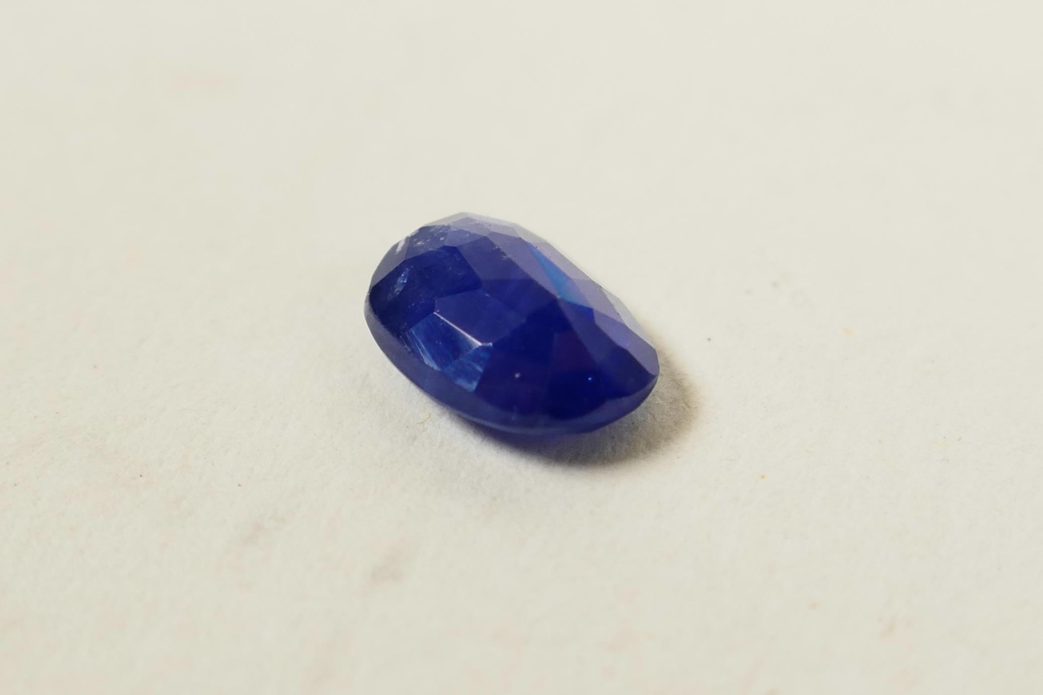 A 1.69ct natural blue sapphire from Sri Lanka, oval cushion mixed cut, GJSPC certified with - Image 3 of 7