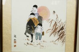 A Chinese watercolour painting of three young boys with a buffalo, signed with calligraphy and red