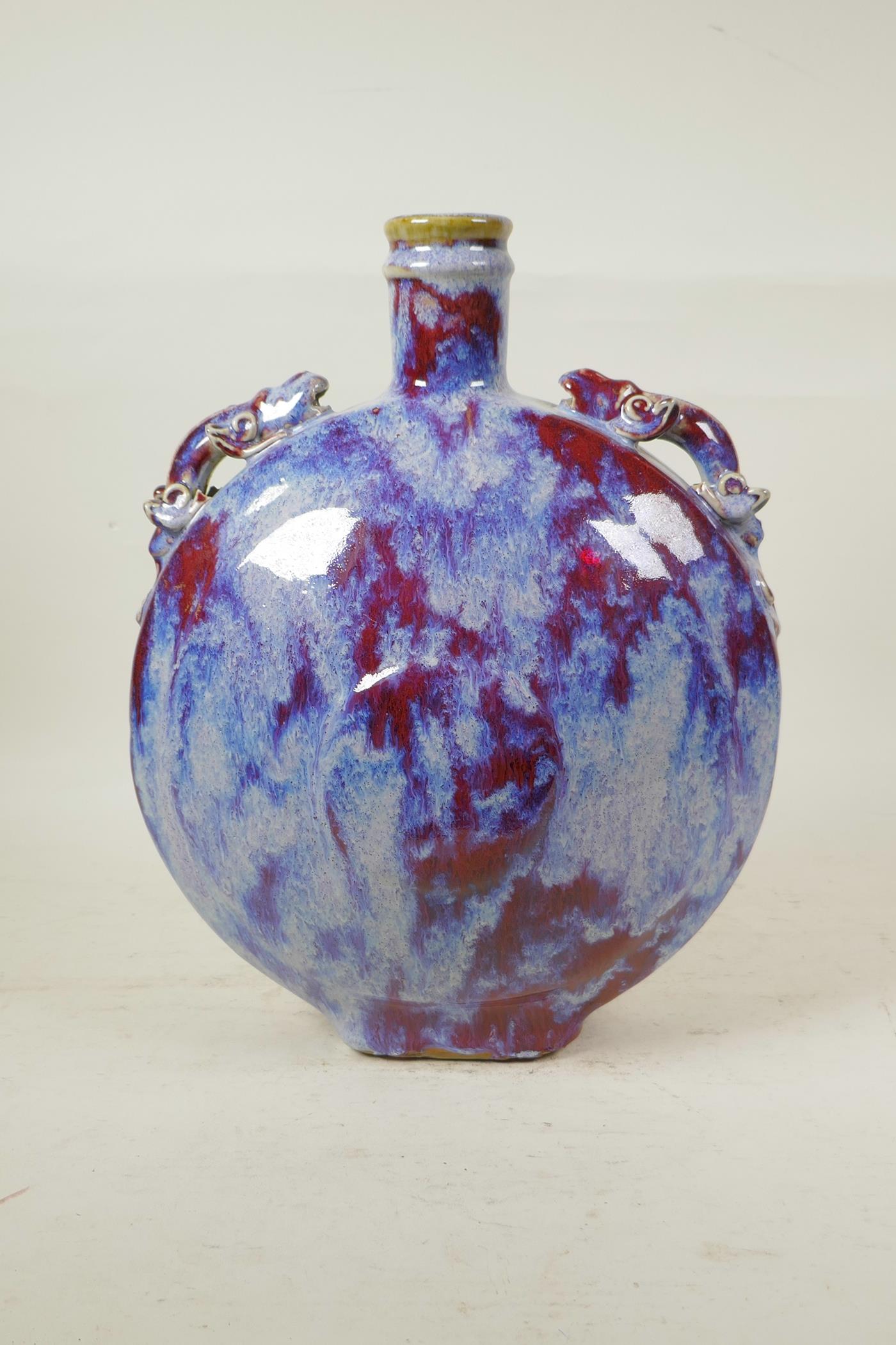 A Chinese flambe glazed pottery moon flask with two dragon shaped handles, 13" high - Image 2 of 4