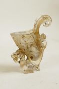 A Chinese crystal style glass jue vessel with dragon decoration, 4" high