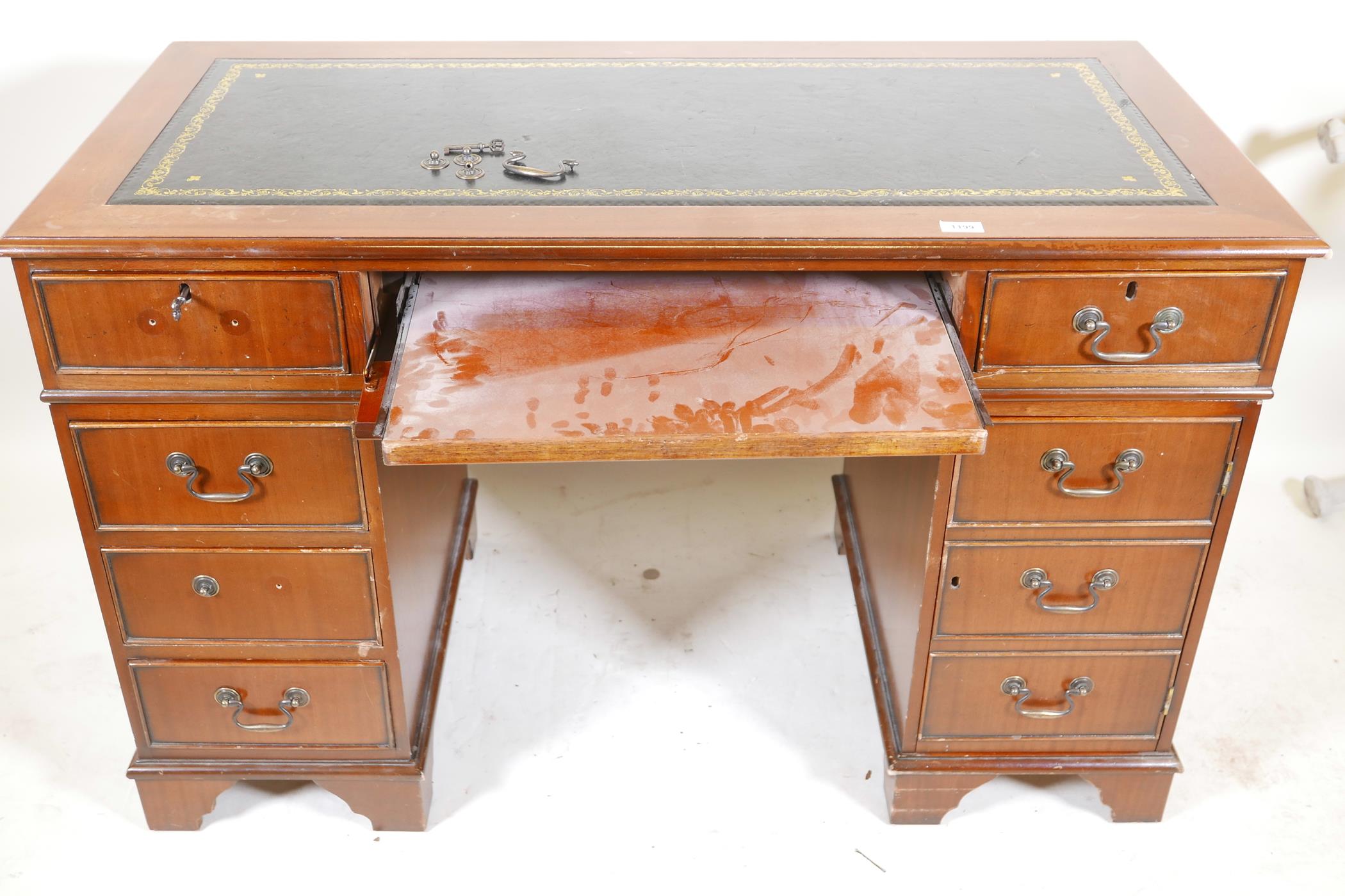 A mahogany pedestal desk with a tooled inset top, hidden keyboard drawer/slide, drawers and a - Image 6 of 6