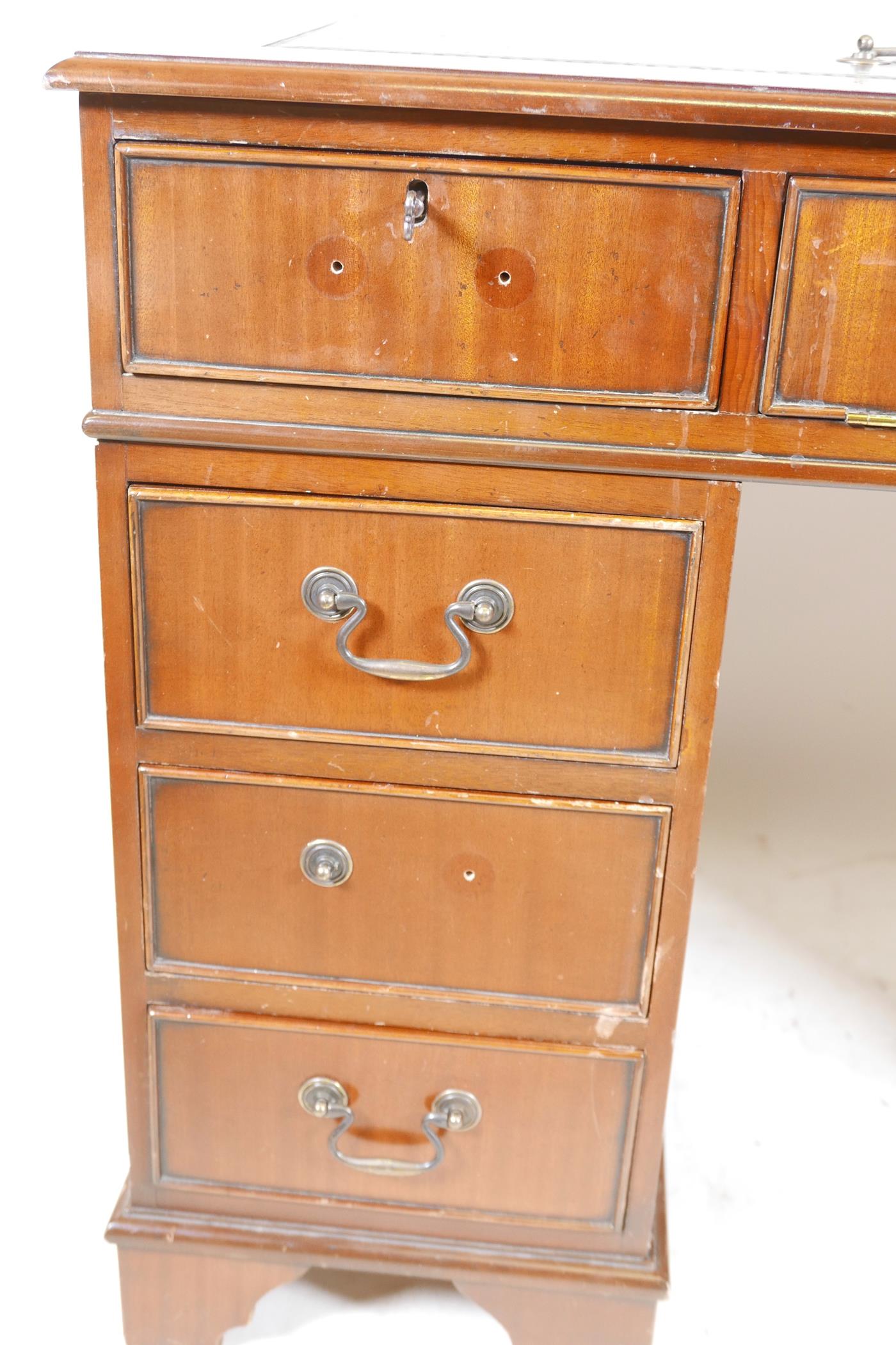 A mahogany pedestal desk with a tooled inset top, hidden keyboard drawer/slide, drawers and a - Image 2 of 6