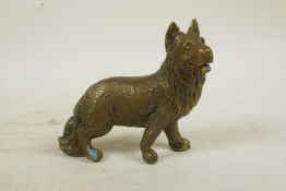 A bronze figure of an Alsatian, 5½" long