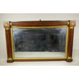 A Regecny rosewood and parcel gilt overmantel mirror, 36" x 22½"