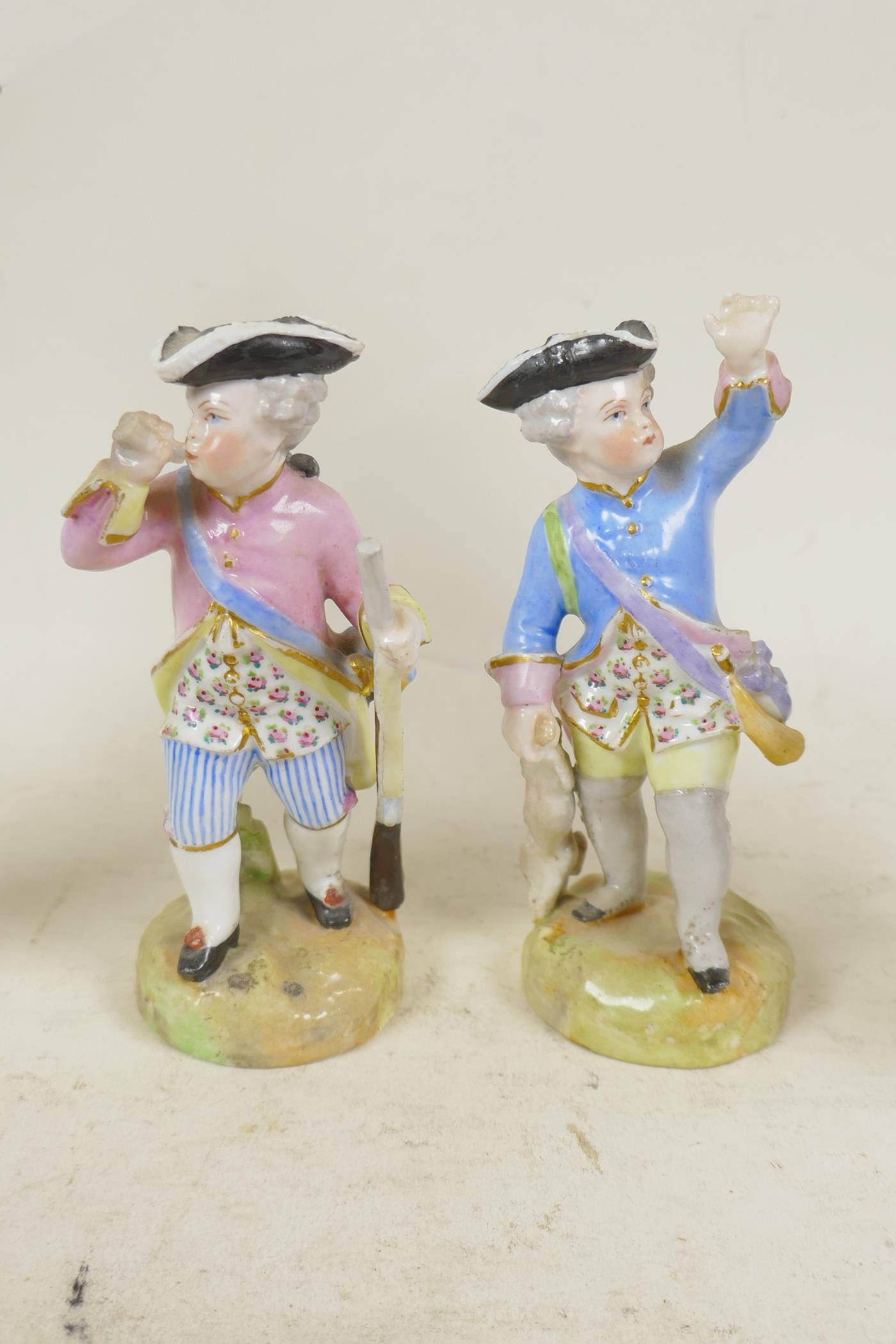 A pair of hard paste figures of musicians, and another pair of child game hunters together with a - Image 4 of 7