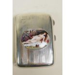 A hallmarked silver engine turned cigarette case with a later applied cold enamel plaque depicting a