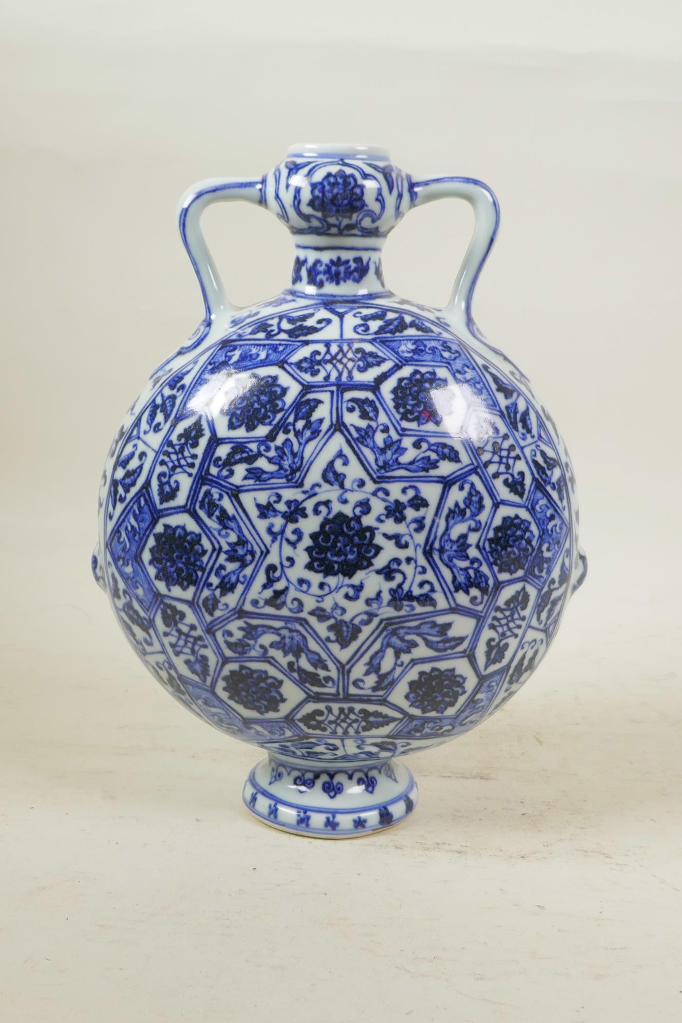 A Chinese blue and white porcelain garlic head shaped flask with two handles decorated with a - Image 2 of 4