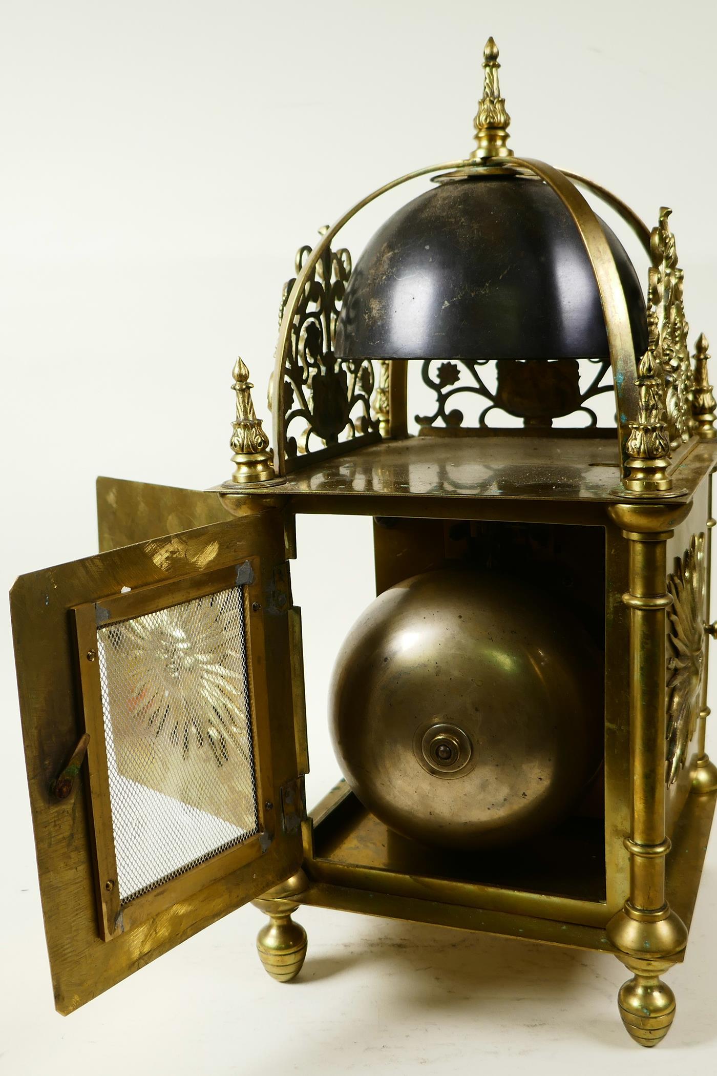 A brass cased lantern clock with two train movement striking on a gong, the case with cast - Image 5 of 7