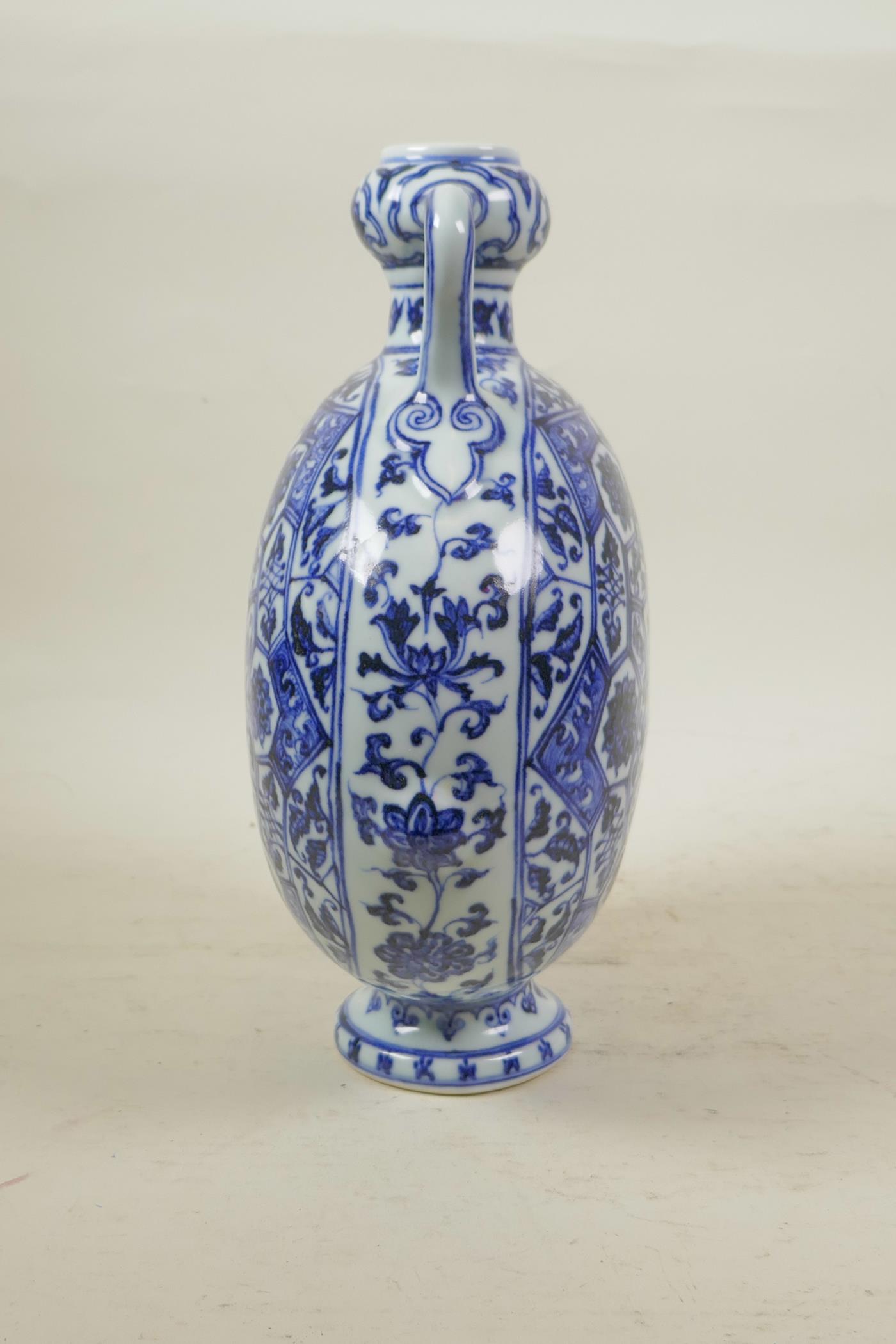 A Chinese blue and white porcelain garlic head shaped flask with two handles decorated with a - Image 3 of 4