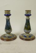 A pair of Royal Doulton stoneware candlesticks in the Art Nouveau style, impressed HA, 6" high