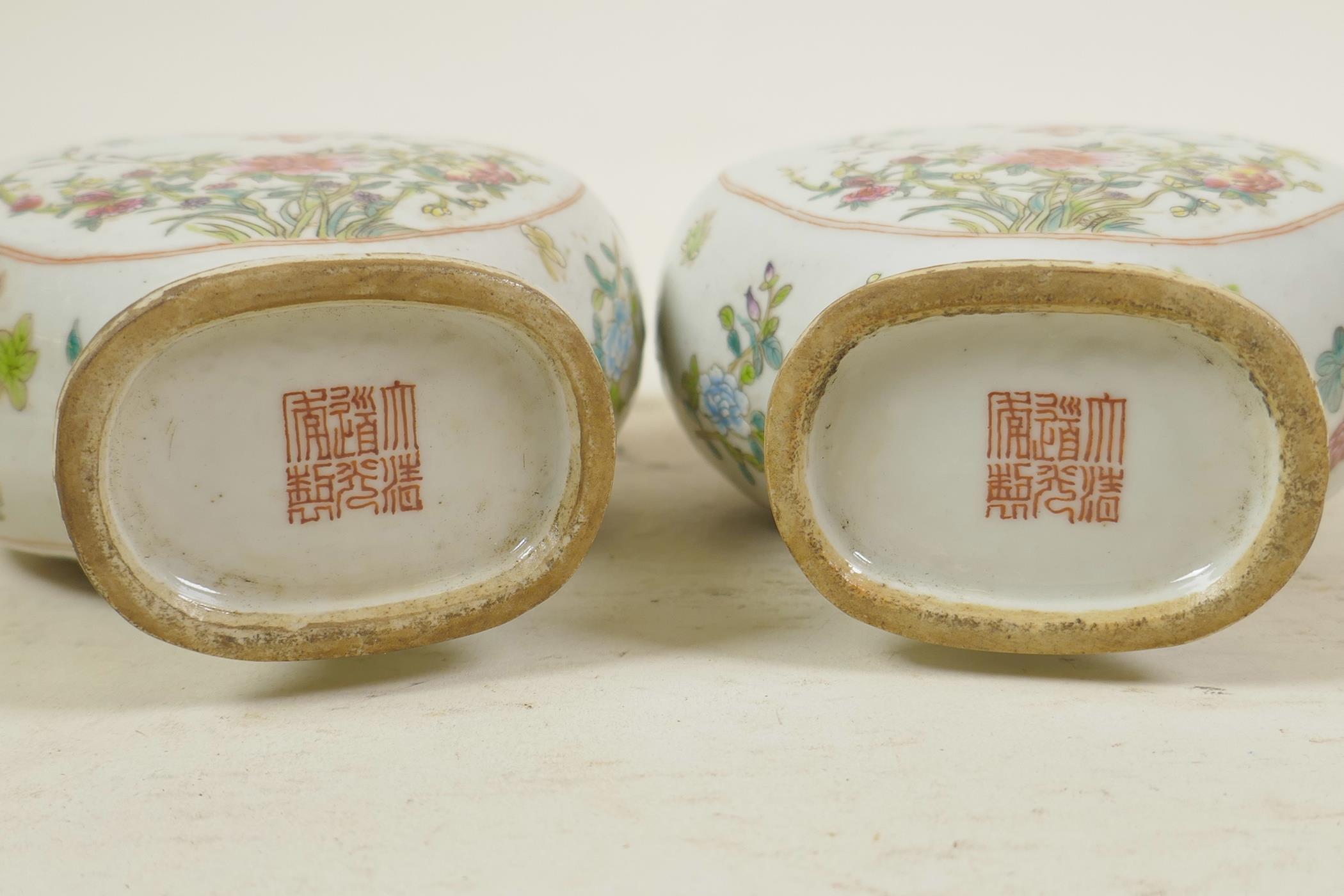 A pair of Chinese polychrome porcelain two handled vases with decorative heart shaped panels - Image 3 of 3