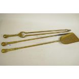 A C19th three piece brass companion set of tongs, poker and shovel with turned brass ball handles,