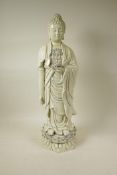 A Chinese blanc de chine porcelain porcelain figure of Buddha standing on a lotus throne,