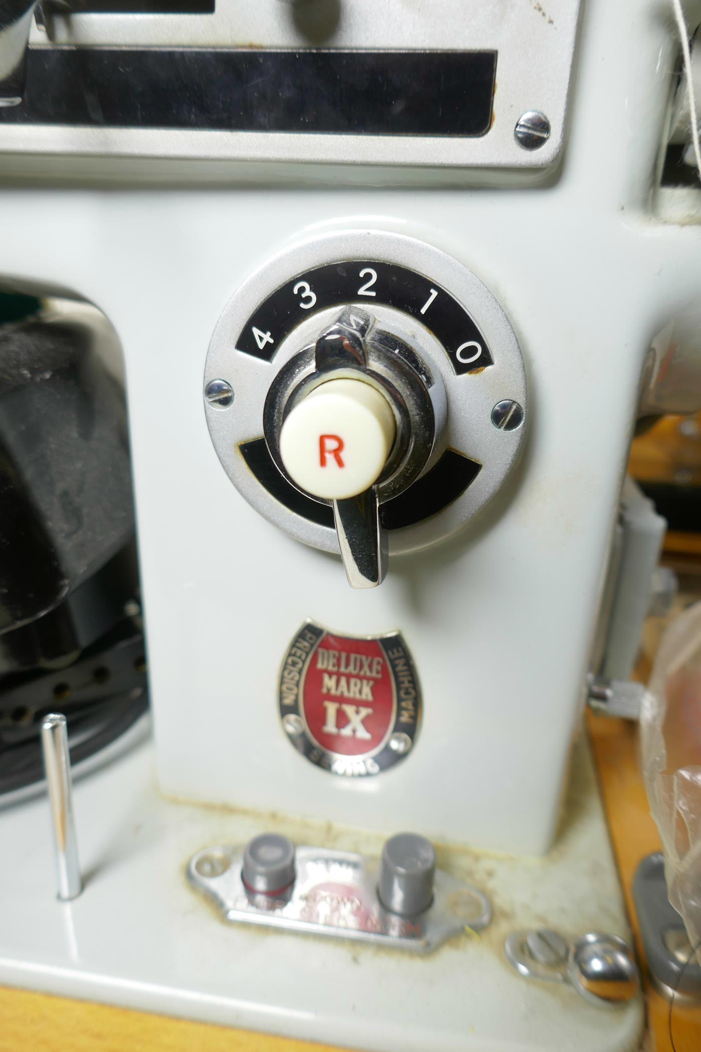 A Singer 99k sewing machine, together with a Novum Deluxe Mark IX sewing machine, largest 19" x 9" x - Image 5 of 5