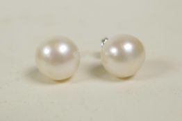 A pair of freshwater pearl stud earrings