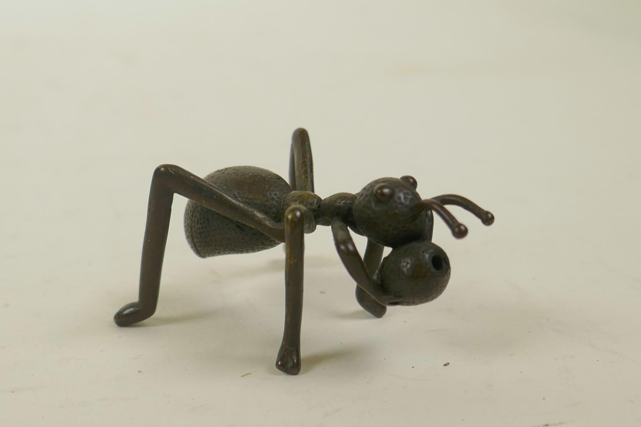 A Japanese Jizai style bronze incense stick holder in the form of an ant, 2" long - Image 2 of 2