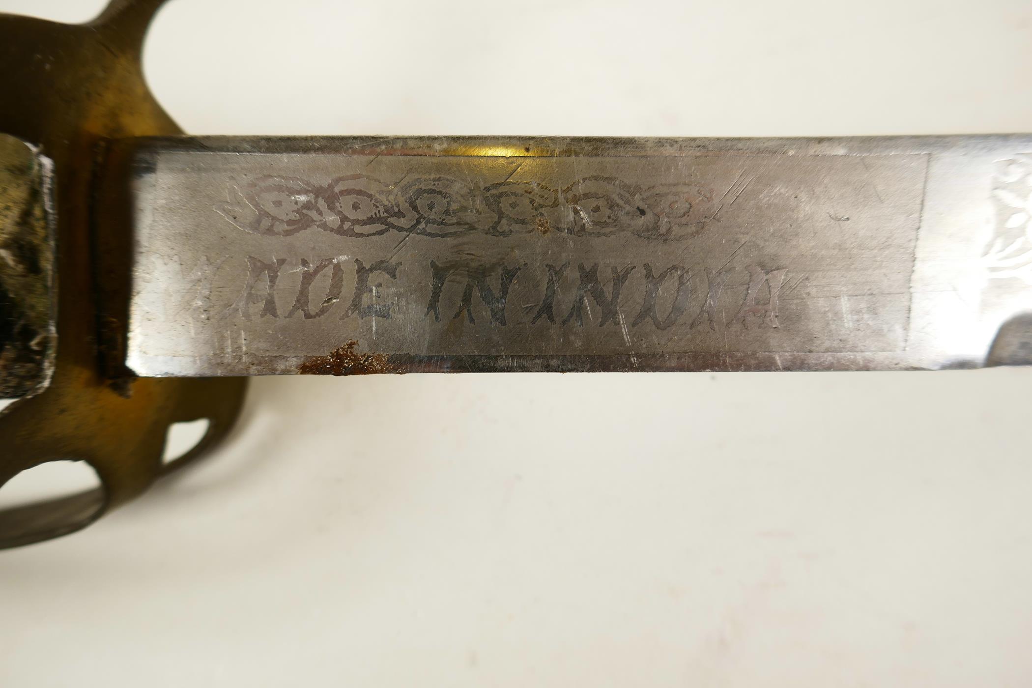 An Indian ceremonial cavalry sword, a WWI replica sabre with 'Made in India' etched to the hilt - Image 2 of 8