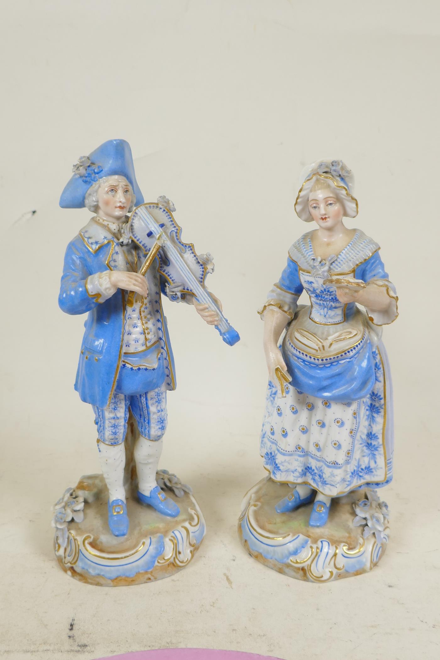 A pair of hard paste figures of musicians, and another pair of child game hunters together with a - Image 6 of 7